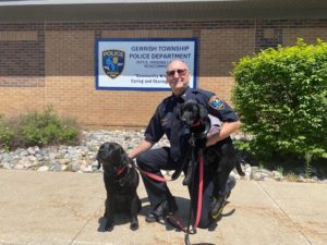 Chief Hill with community service dogsWade & O'Hara